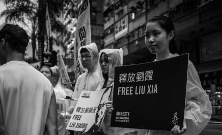 An Activist demonstrates for the release of Lio Xia