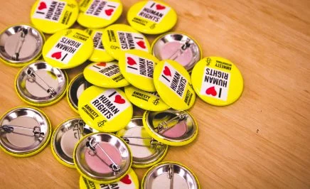 Amnesty International I love human rights buttons