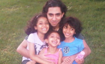 Raif Badawi with his kids