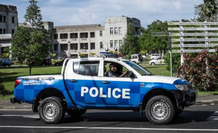 A Fijian police car in a busy street