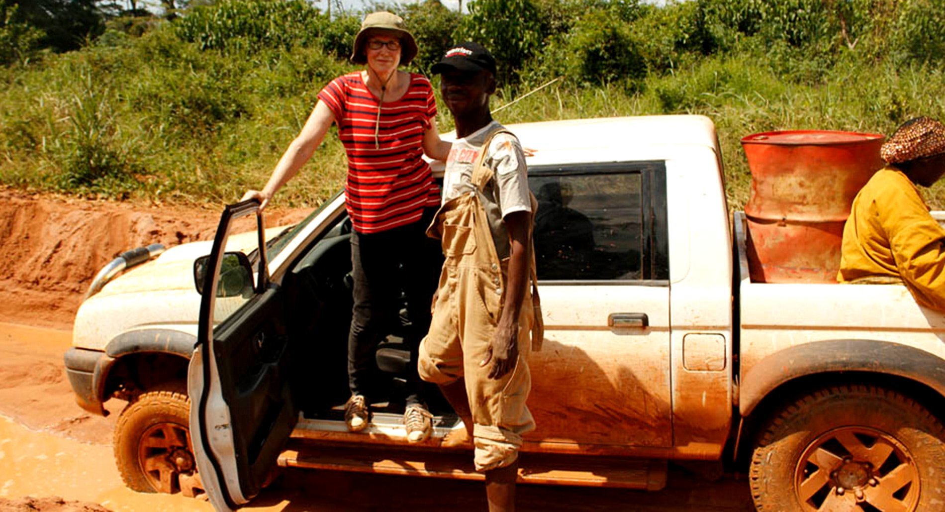 Senior Crisis Response Adviser Joanne Mariner and her car, stuck in the mud in the Central African Republic.
