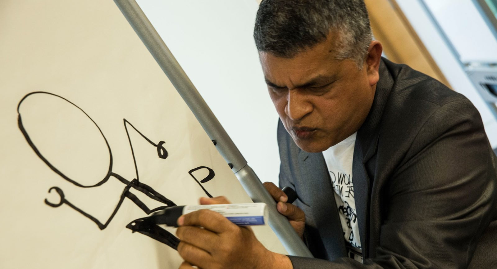 Malaysian cartoonist Zunar giving an illustration workshop at Amnesty International head office