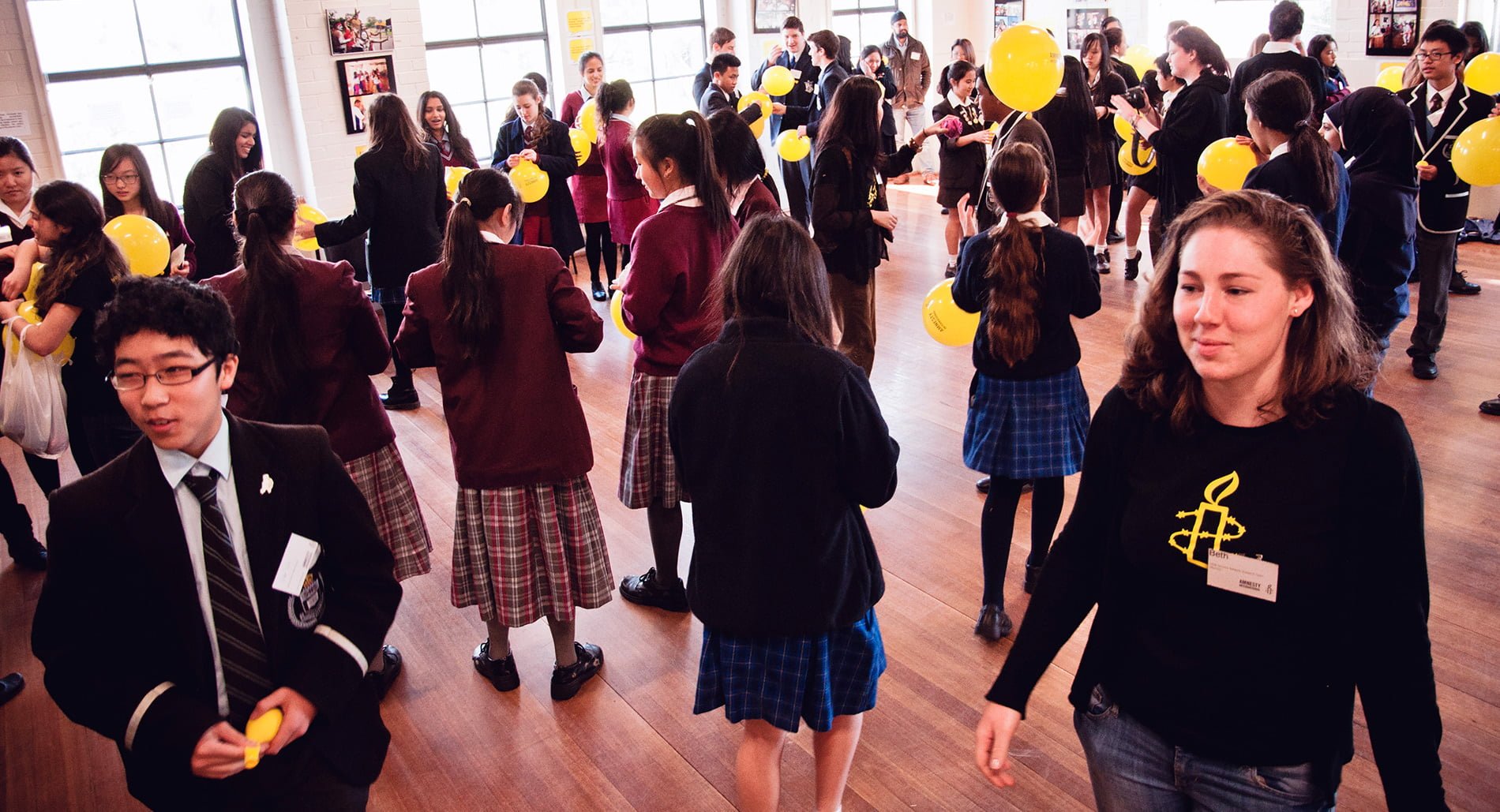 Children and activists at an Amnesty NSW schools conference