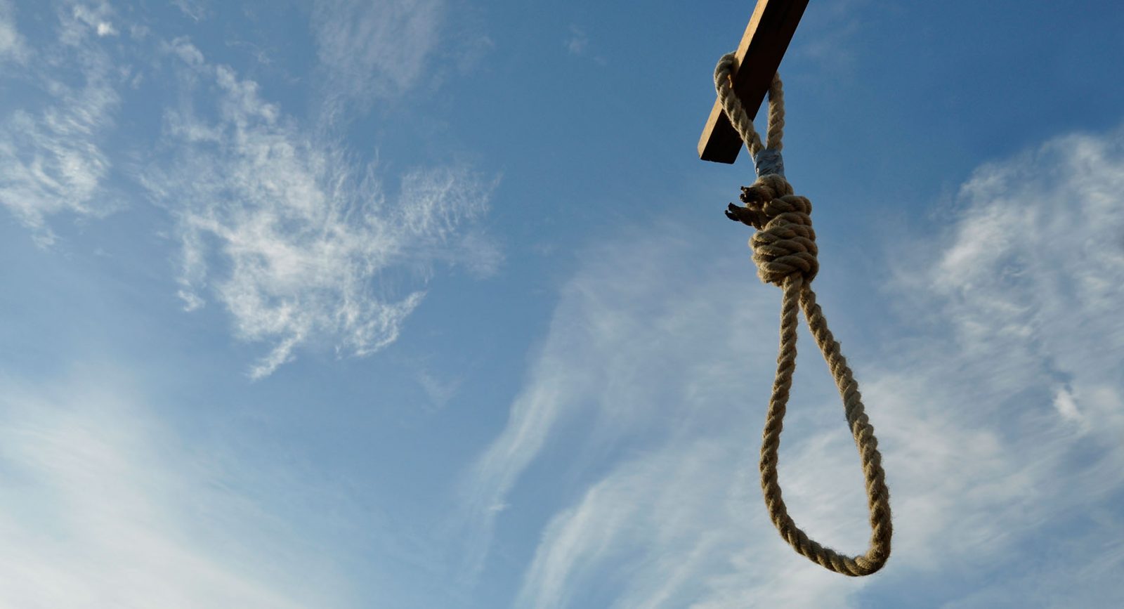 A hangman's noose against a blue sky
