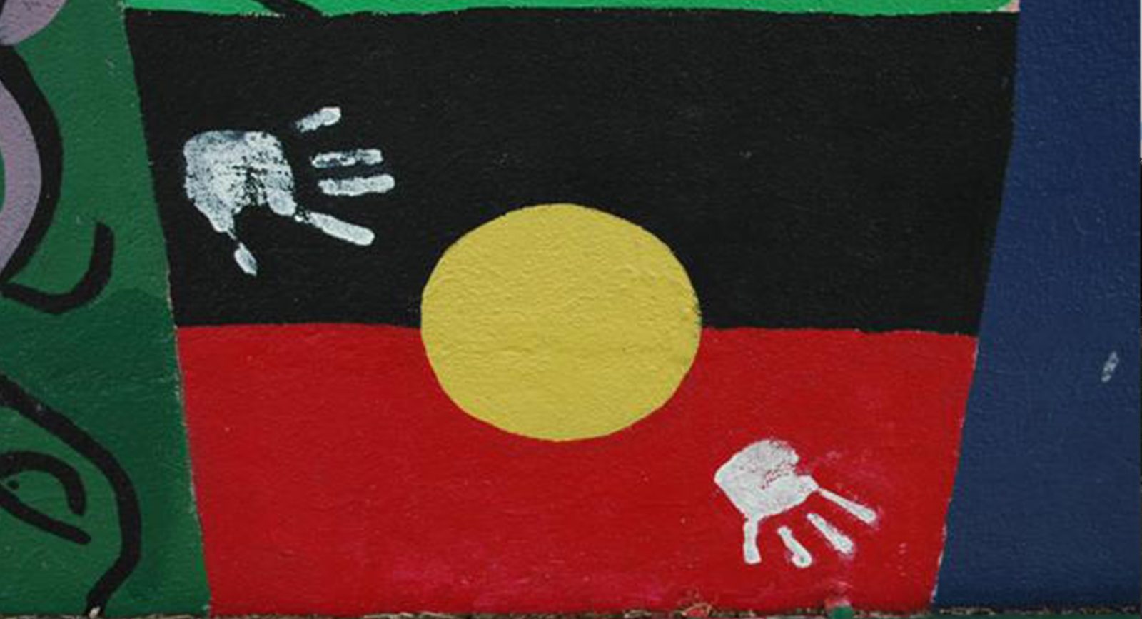 Street art of an Aboriginal flag