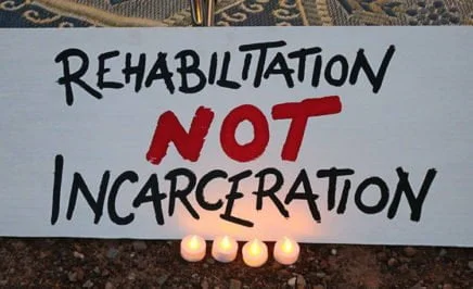 Sign calling for rehabilitation not incarceration at Don Dale vigil.