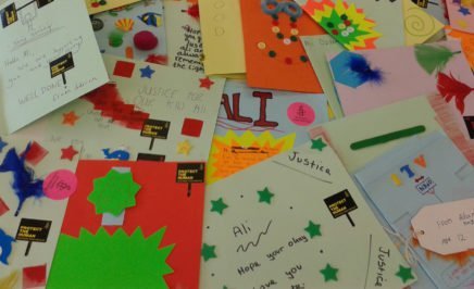 Solidarity cards made by school children for Ali Ozdemir, a Syrian national who was shot in the head and blinded at 14 years old when he approached the Turkish border. © Amnesty International