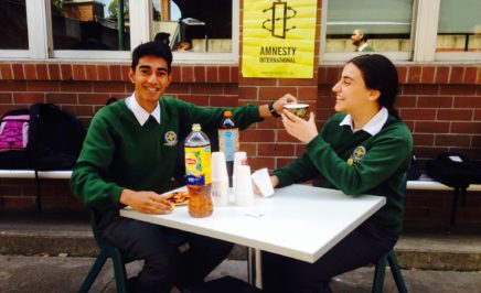 school students drink tea at the annual Amnestea fundraiser