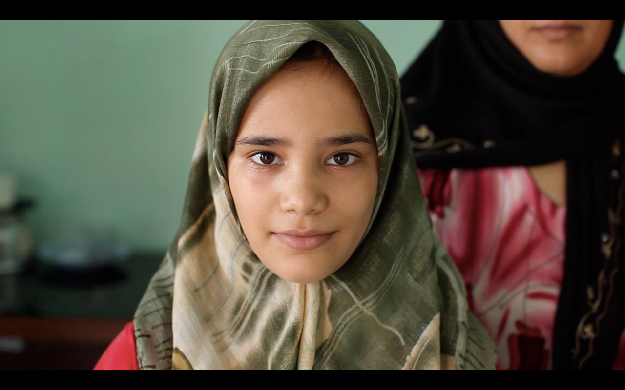 Still of a young Afghani girl feature in 'Between the Devil and the Deep Blue Sea'