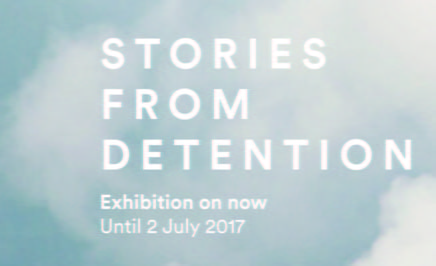 Stories From Detention - Immigration Museum - this text is displayed on a background of a blue sky with white clouds.