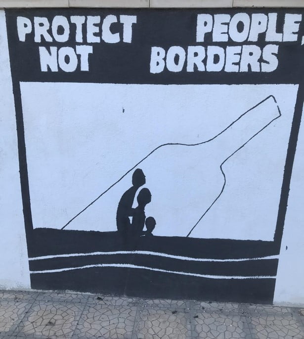 A sign in Lampedusa reading 'Protect people not borders'.