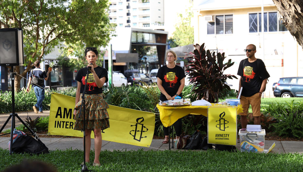 Amnesty activists speaking at Indigenous rights event in Darwin