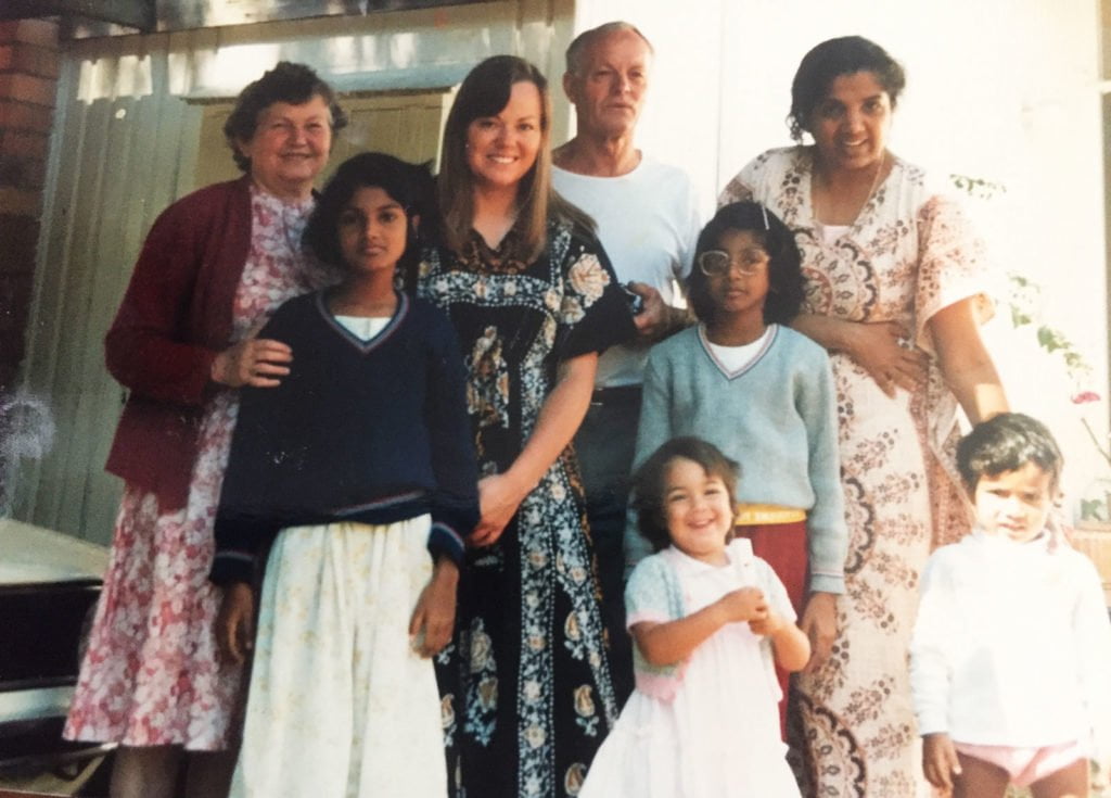 Amnesty Australia's Refugee Campaign Coordinator Shankar Kasynathan as a child with his mother and sisters and the family who sponsored them to stay in Australia