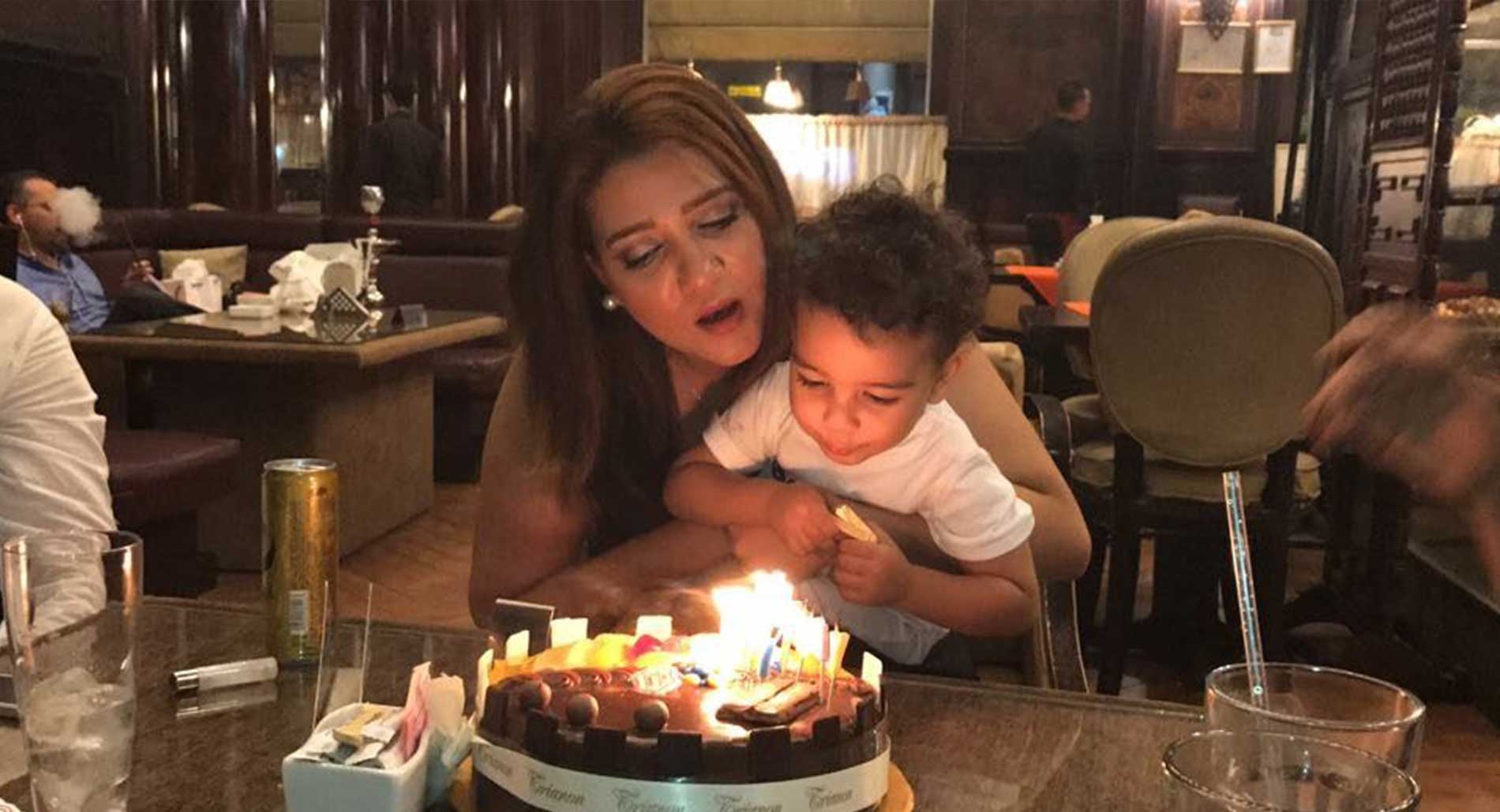 Amal Fathy with her child. © Private