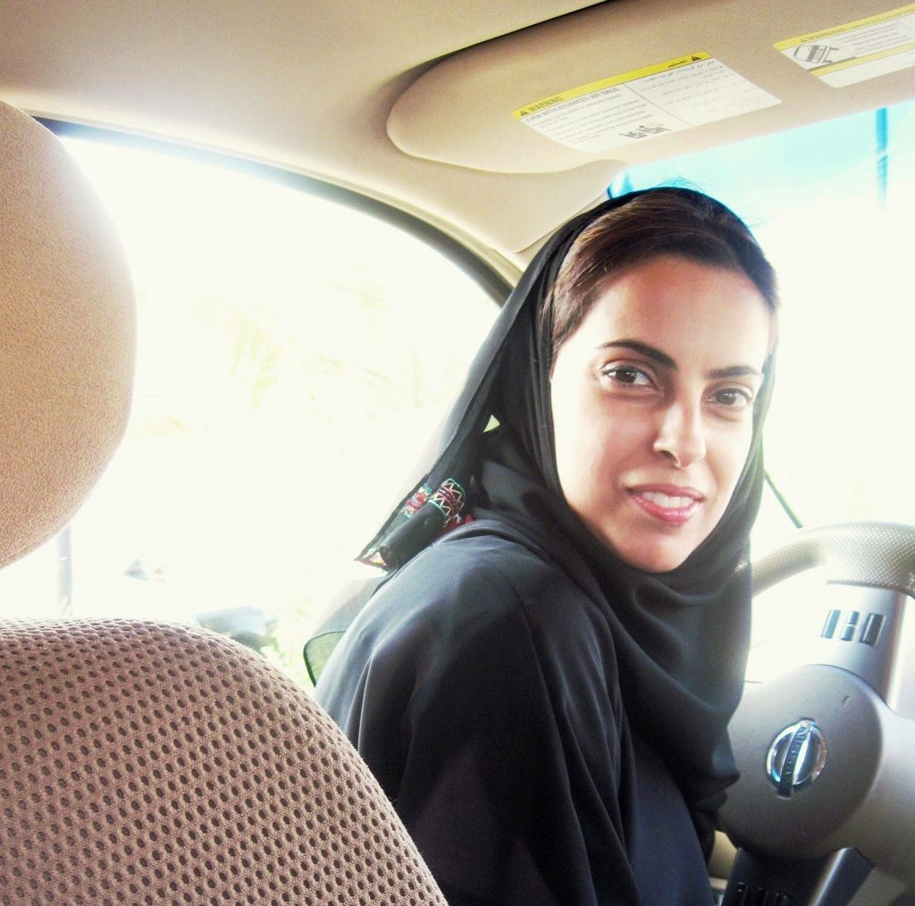 A Saudi Arabian woman taking the wheel in support of the #women2drive initiative in Saudi Arabia.