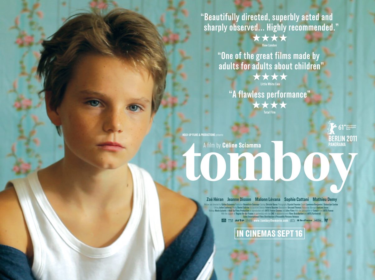 A child looking sad in front of the movie title 'Tomboy