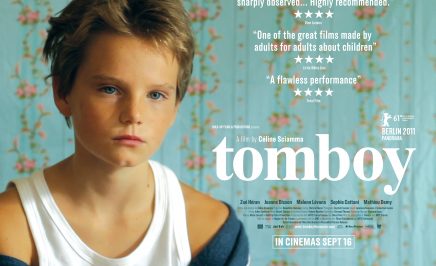 A child looking sad in front of the movie title 'Tomboy