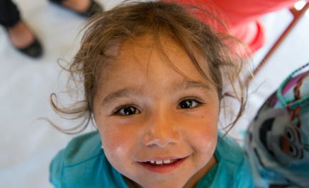 Picture of a child staring into the camera