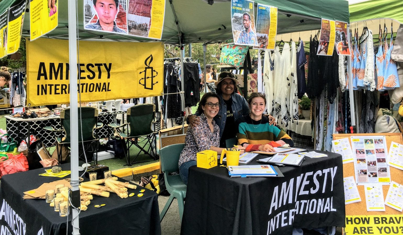Three women at Amnesty stall in Manly