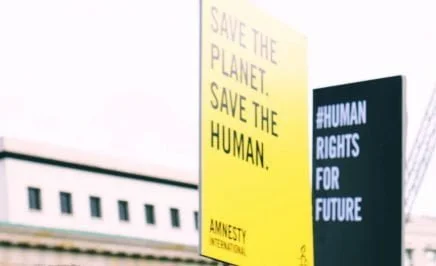 Amnesty climate placards