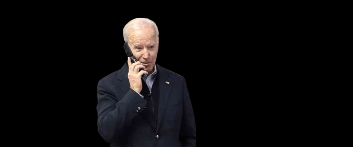 President Joe Biden on the phone against a black background