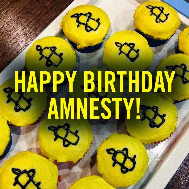 yellow cupcakes with Amnesty Candles