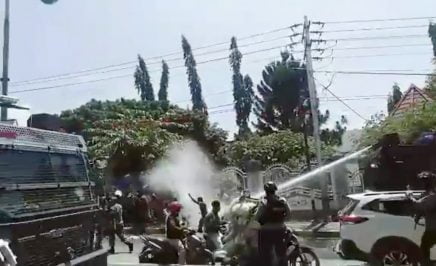 Video Still showing the use of water cannon against protestors in West Papua