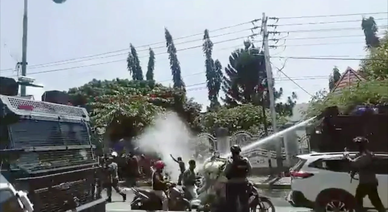 Video Still showing the use of water cannon against protestors in West Papua