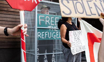 Refugee Advocates Rally Outside Detainee Hotel