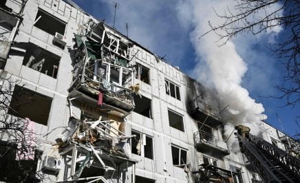 image of ukraine apartment building that has been destroyed by a missile