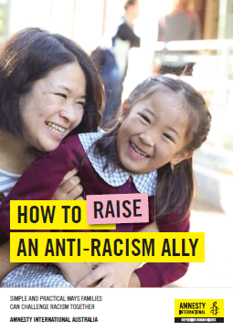 Image of a young girl laughing in her mum's arms. Title of the guide reads "How to raise an anti-racism ally"