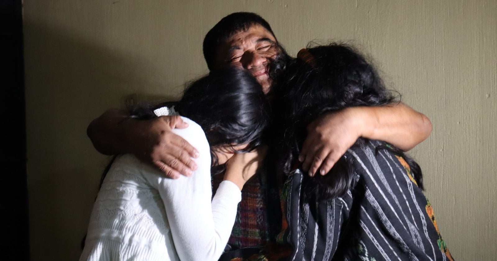 Bernardo Caal Xol embracing his family after his release