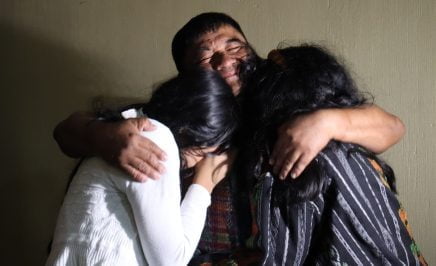 Bernardo Caal Xol embracing his family after his release