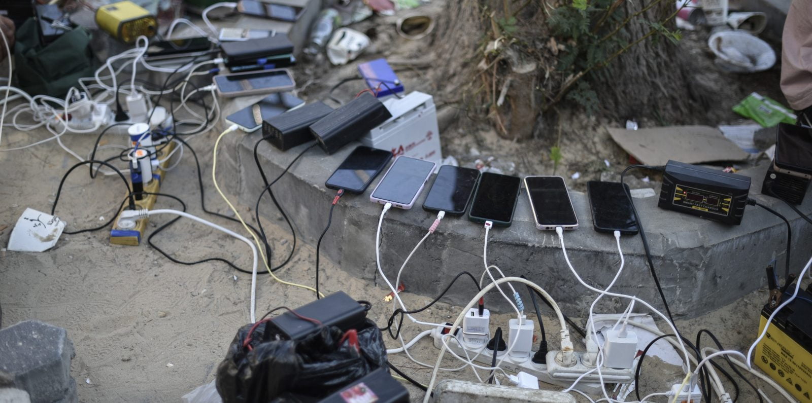 A view of Phones being charged by portable charging stations at Palestinian Red Crescent center