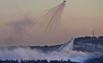 A shell from Israeli artillery explodes over Dahaira, a Lebanese border village with Israel, south Lebanon, Monday, Oct. 16, 2023 (AP Photo/Hussein Malla)
