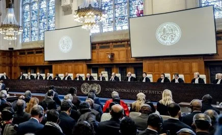 ICJ President Joan Donoghue (C) speaks at the International Court of Justice (ICJ) prior to the verdict announcement in the genocide case against Israel, brought by South Africa, in The Hague on January 26, 2024.