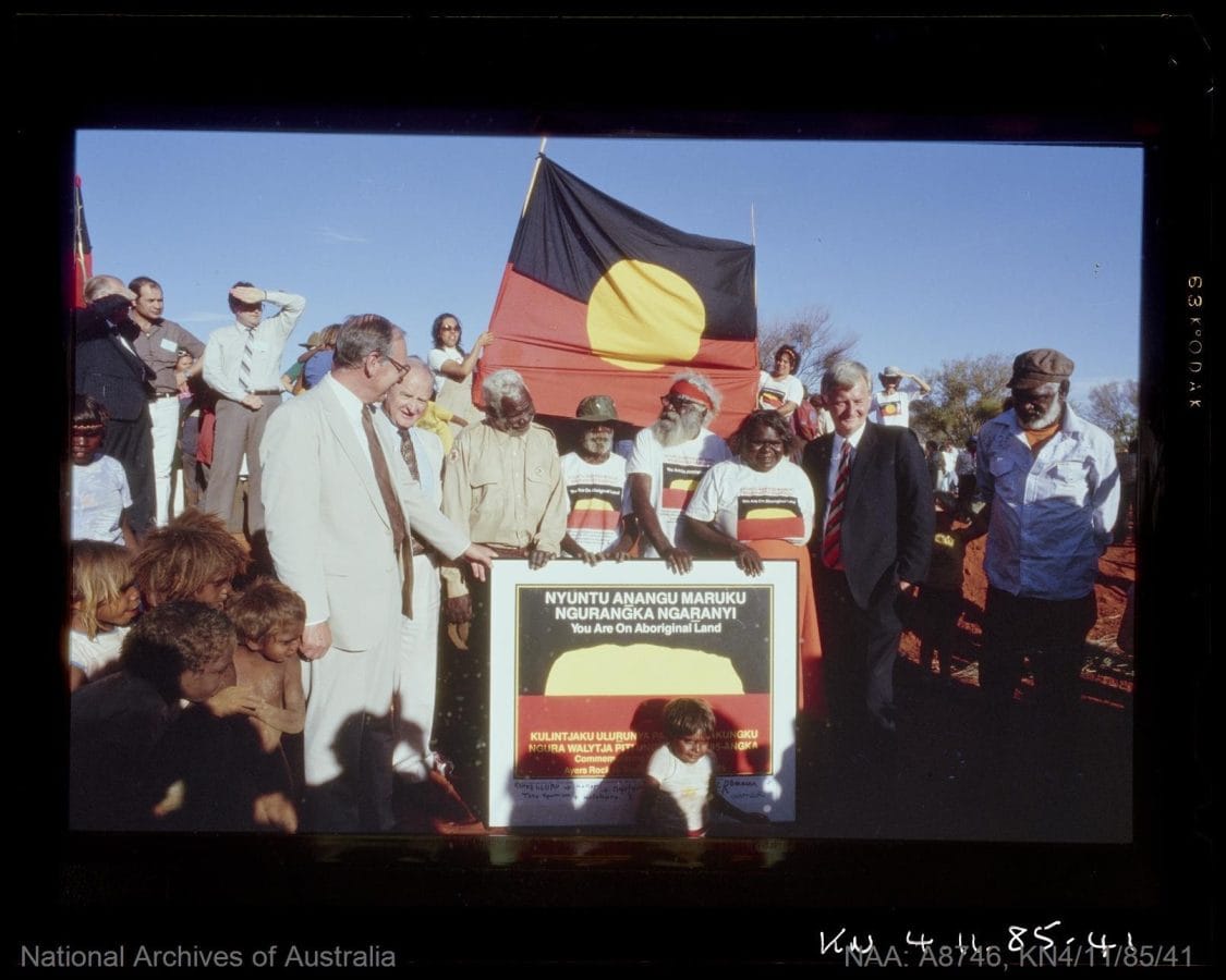 Aboriginal people and Torres Strait Islander peoples - handover of Uluru to traditional owners.