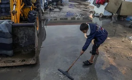 KHAN YUNIS, GAZA - DECEMBER 16: Palestinians struggle with flooding after heavy rain hits the Khan Yunis, Gaza on December 16, 2025. The damaged tents, already vulnerable due to harsh winter conditions, further worsened living conditions for civilians struggling to survive in cold and difficult circumstances. (Photo by Abed Rahim Khatib/Anadolu via Getty Images)