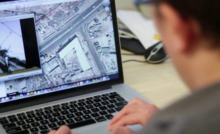 Pictured: Christoph Koetti, Founder and Editor of Amnesty's Crisis Evidence Lab verifying footage of human rights violations.