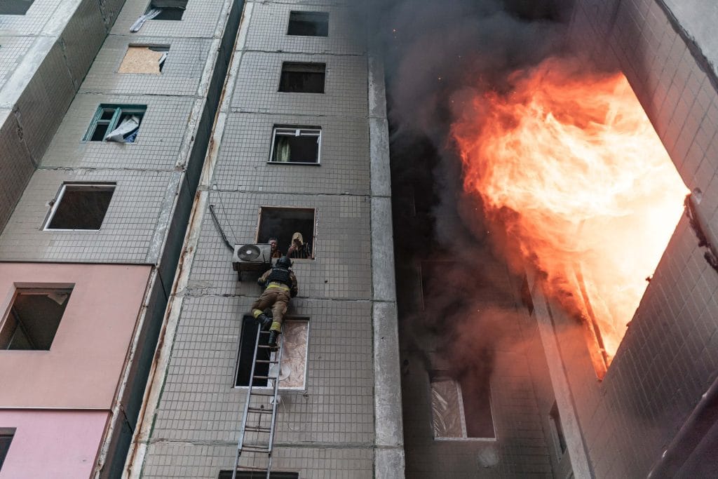 KOSTIANTYNIVKA, UKRAINE - AUGUST 22: Ukrainian firefighters work to extinguish a blaze in a residential building after Russian shelling hit the city of Kostiantynivka, Ukraine, on August 22, 2025. (Photo by Diego Herrera Carcedo/Anadolu via Getty Images)